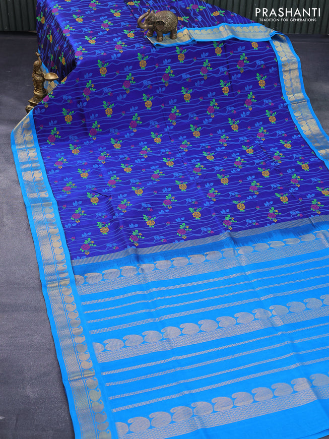 Silk cotton saree blue and cs blue with allover floral prints and paisley zari woven korvai border