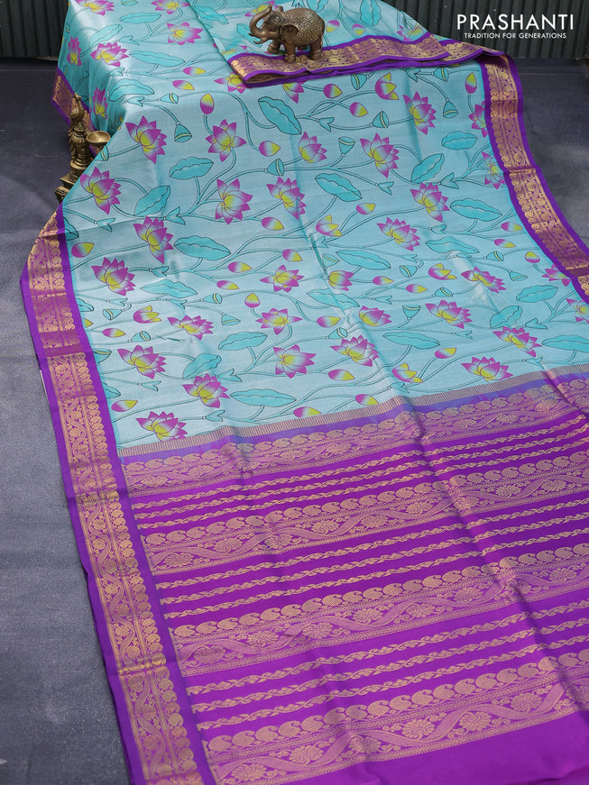 Silk cotton saree teal green and purple with allover pichwai prints and zari woven korvai border