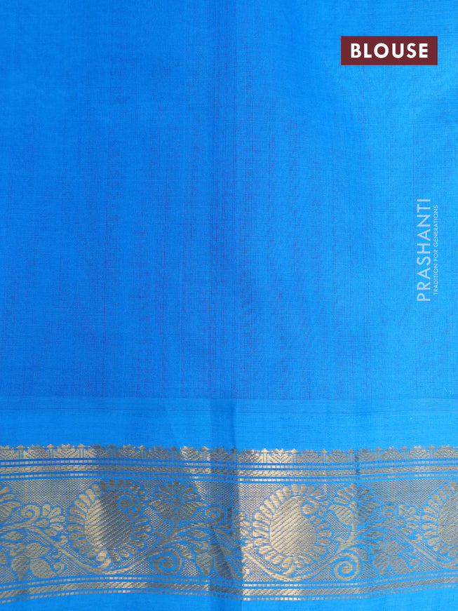 Silk cotton saree blue and cs blue with allover prints and zari woven korvai border