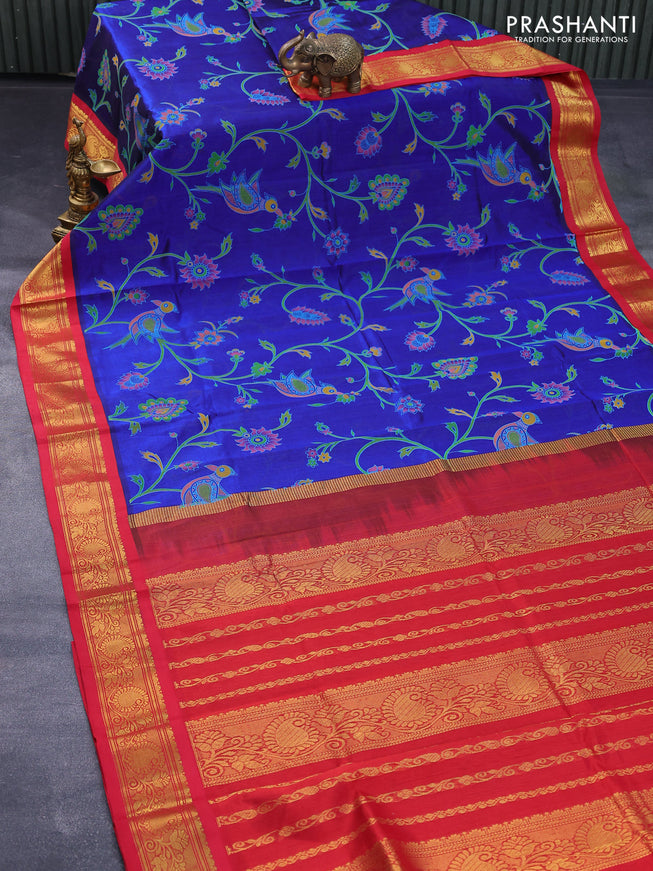 Silk cotton saree blue and maroon with allover prints and zari woven korvai border