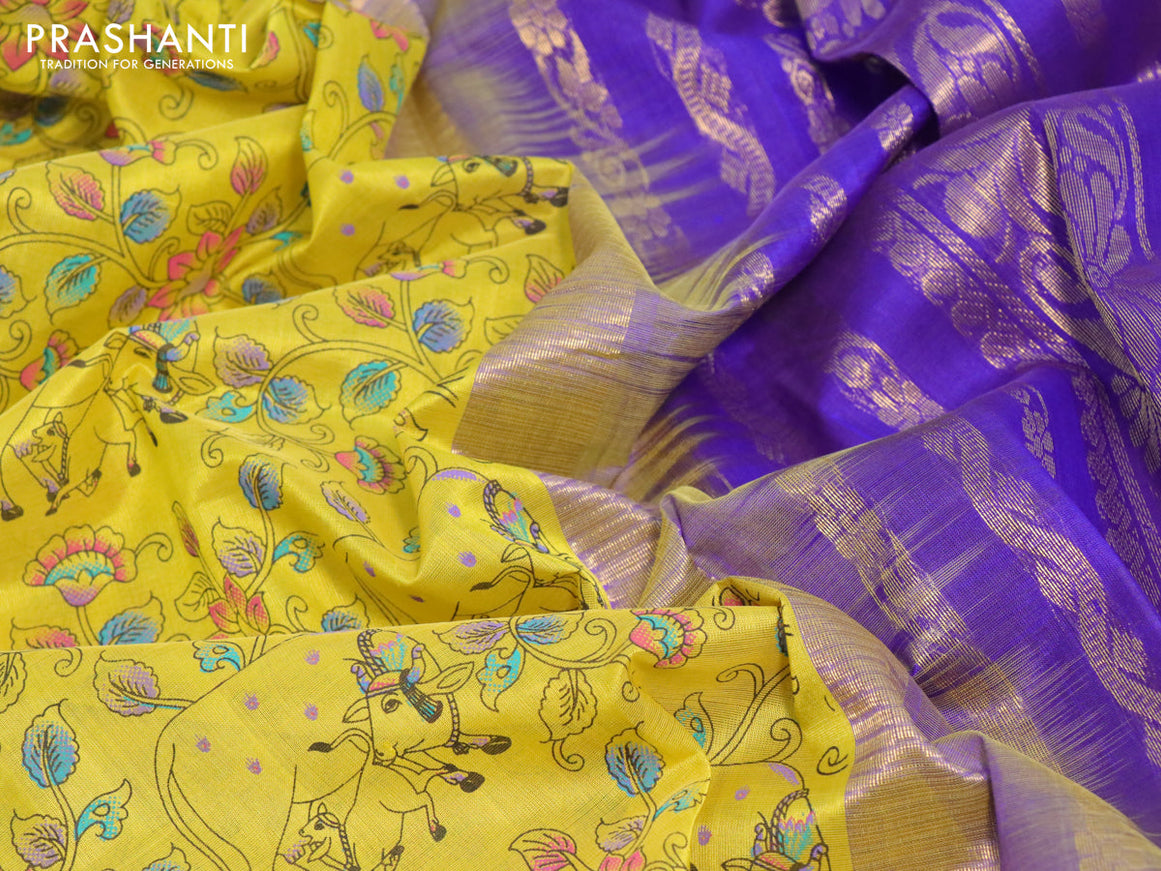 Silk cotton saree yellow and violet with allover pichwai prints and zari woven korvai border