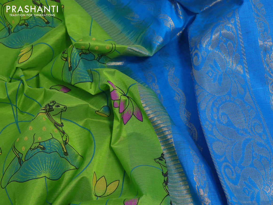 Silk cotton saree light green and cs blue with allover pichwai prints and zari woven korvai border