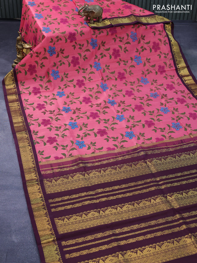Silk cotton saree peach pink and deep wine shade with allover floral prints and zari woven korvai border