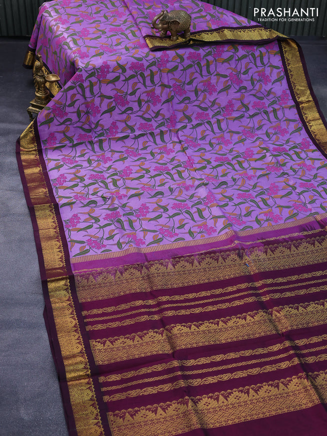 Silk cotton saree lavender shade and deep wine shade with allover floral prints and zari woven korvai border