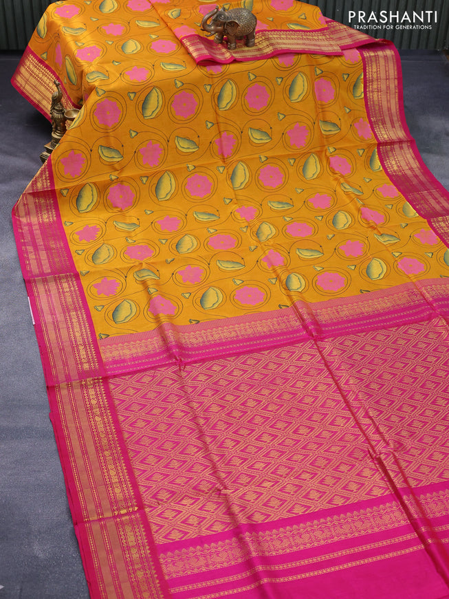 Silk cotton saree mustard yellow and pink with allover pichwai prints and zari woven korvai border