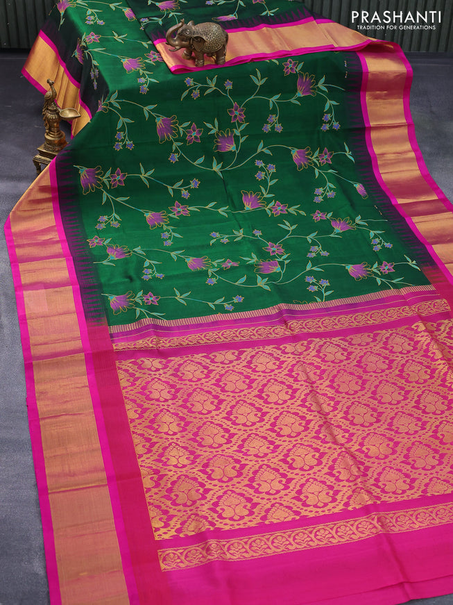 Silk cotton saree green and pink with allover floral prints and temple design zari woven border