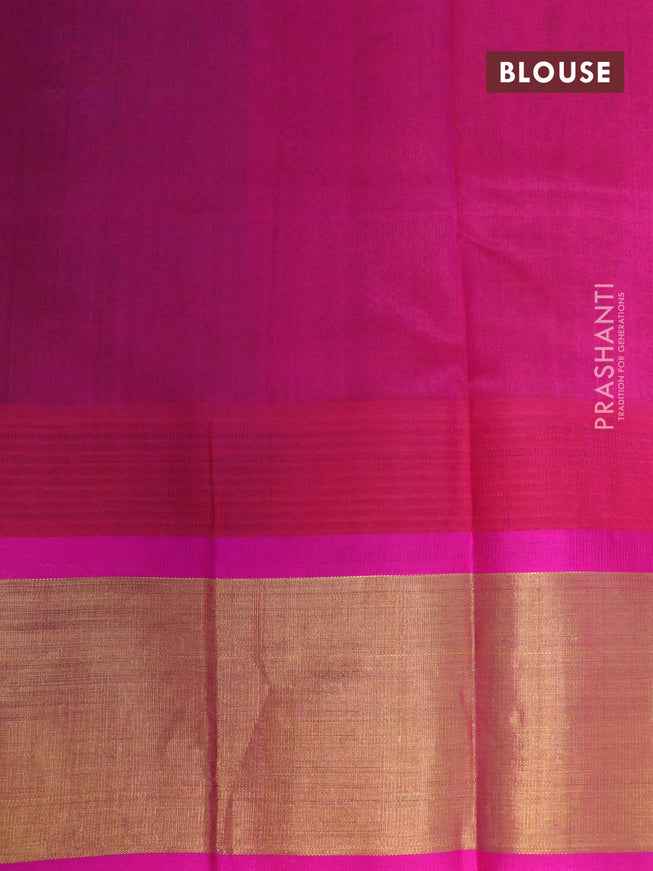 Silk cotton saree green and pink with allover floral prints and temple design zari woven border