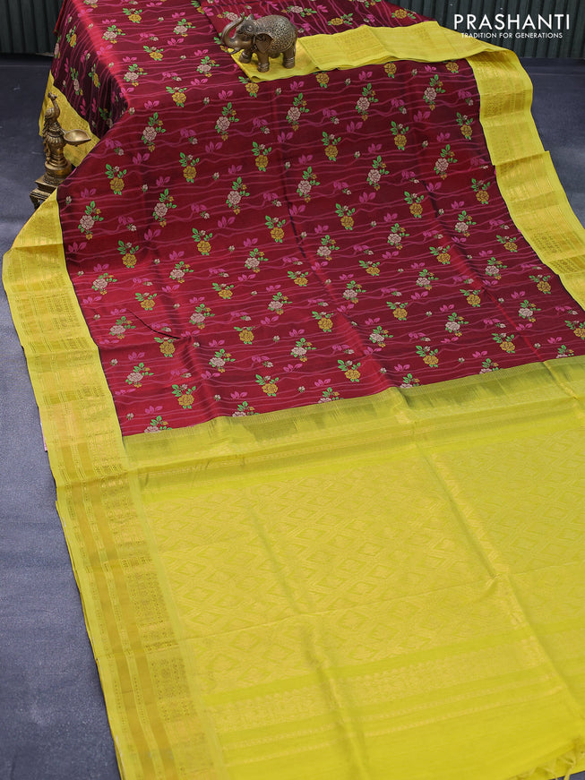 Silk cotton saree maroon and lime yellow with allover floral prints and paisley zari woven korvai border