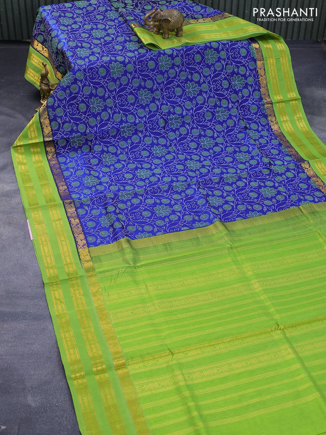 Silk cotton saree blue and light green with allover floral prints and rettapet zari woven korvai border