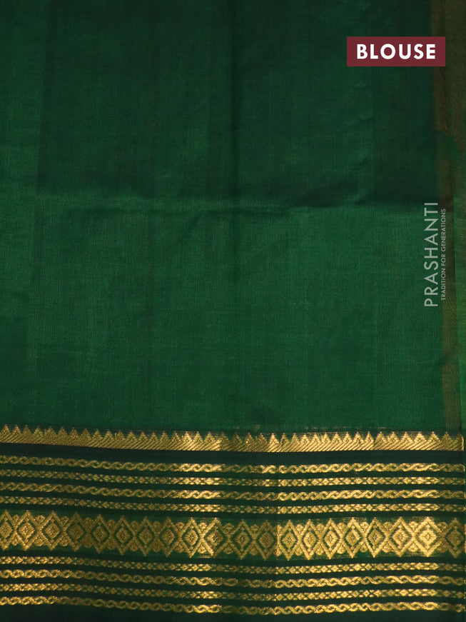 Silk cotton saree sunset orange and green with allover floral prints and zari woven korvai border