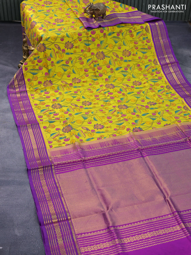 Silk cotton saree yellow and purple with allover pichwai prints and zari woven korvai border