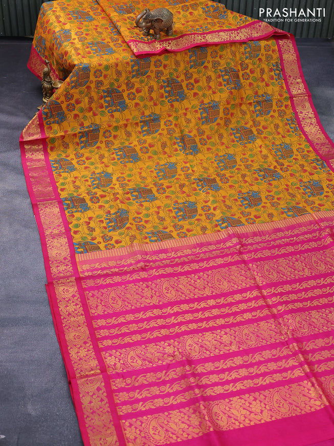 Silk cotton saree mustard yellow and pink with allover kalamkari prints and zari woven korvai border