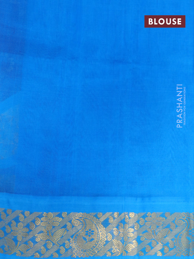 Silk cotton saree purple and cs blue with allover floral prints and zari woven korvai border