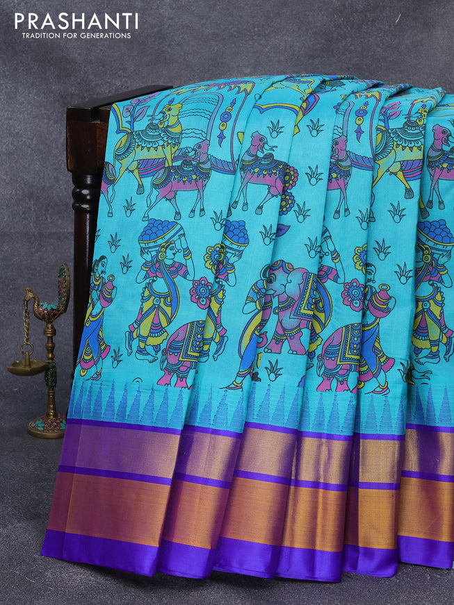 Silk cotton saree teal blue and royal blue with allover prints and temple design zari woven simple border