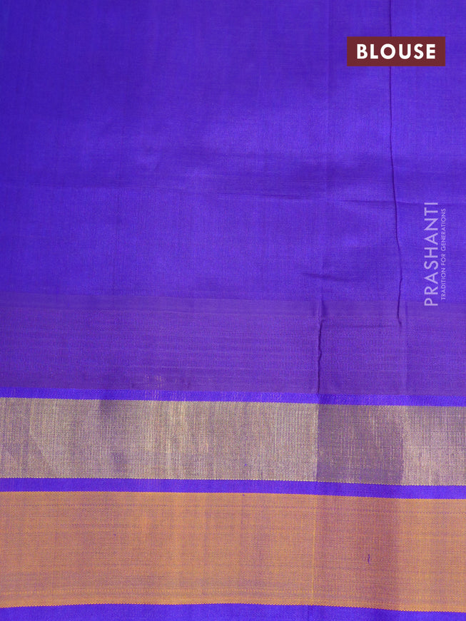 Silk cotton saree teal blue and royal blue with allover prints and temple design zari woven simple border