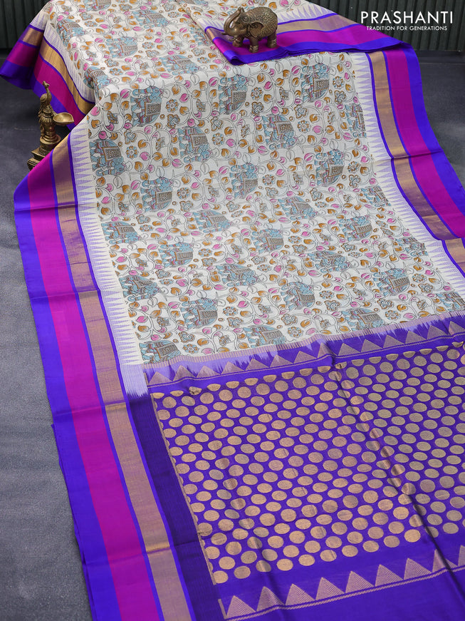 Silk cotton saree cream and blue with allover kalamkari prints and temple design zari woven simple border
