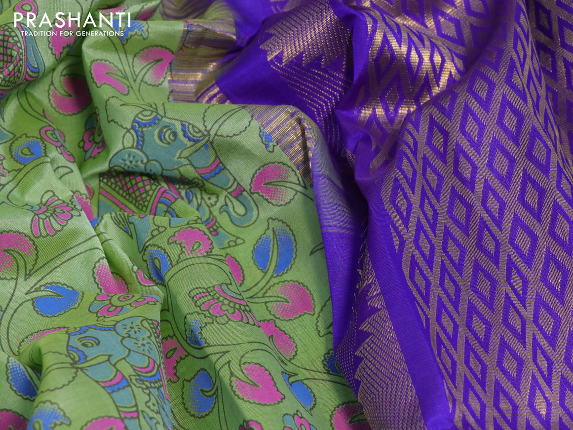 Silk cotton saree light green and blue with allover kalamkari prints and temple design zari woven simple border