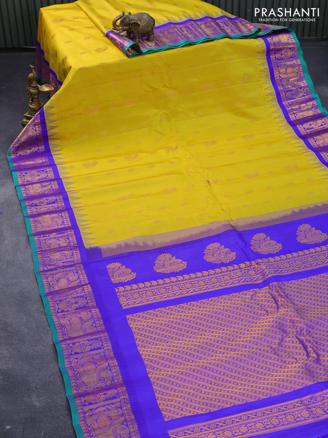 Pure gadwal silk saree yellow and blue with zari woven buttas and temple design annam zari woven border