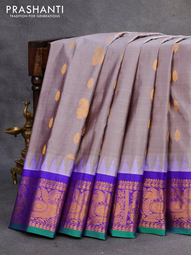 Pure gadwal silk saree grey shade and royal blue with zari woven buttas and temple design annam zari woven border