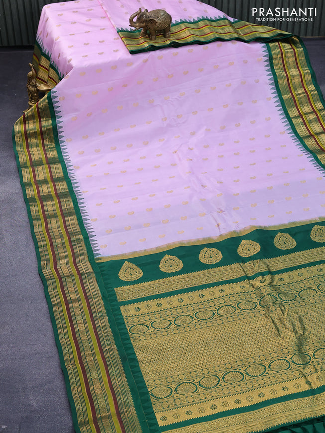 Pure gadwal silk saree lavender shade and green with paisley zari woven buttas and temple design zari woven border