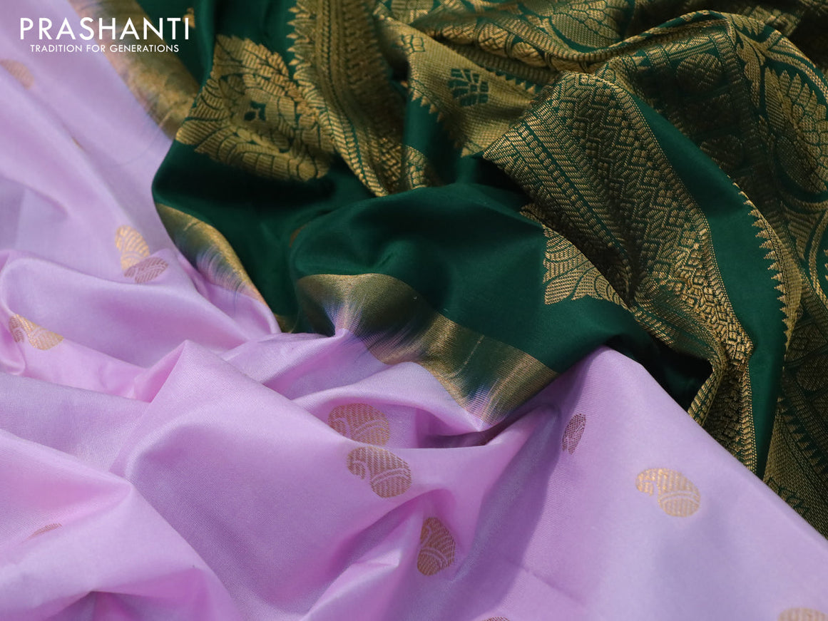Pure gadwal silk saree lavender shade and green with paisley zari woven buttas and temple design zari woven border