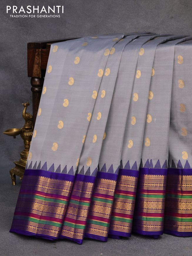 Pure gadwal silk saree grey and blue with paisley zari woven buttas and temple design zari woven border