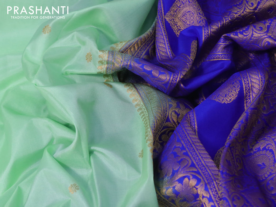 Pure gadwal silk saree pista green and blue with zari woven buttas and temple design floral zari woven border