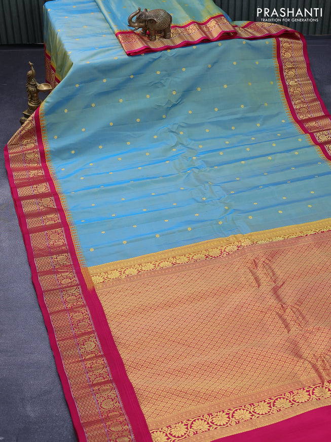 Pure gadwal silk saree dual shade of teal blue and pink with zari woven buttas and zari woven border