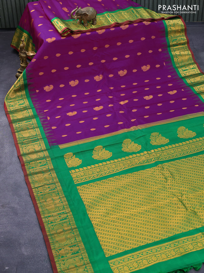 Pure gadwal silk saree purple and green with zari woven buttas and temple design annam zari woven border