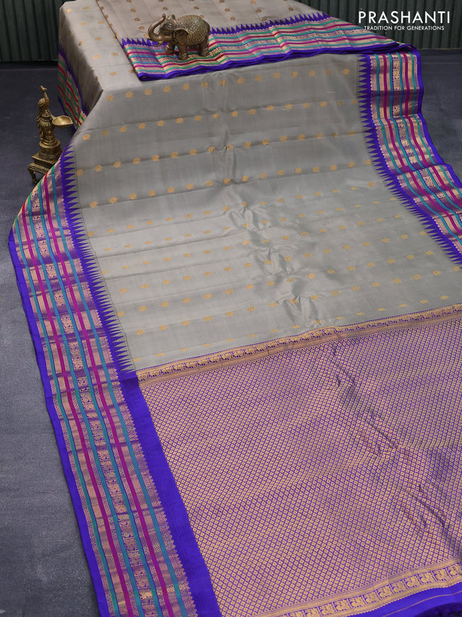 Pure gadwal silk saree grey and blue with annam zari woven buttas and temple design zari woven border
