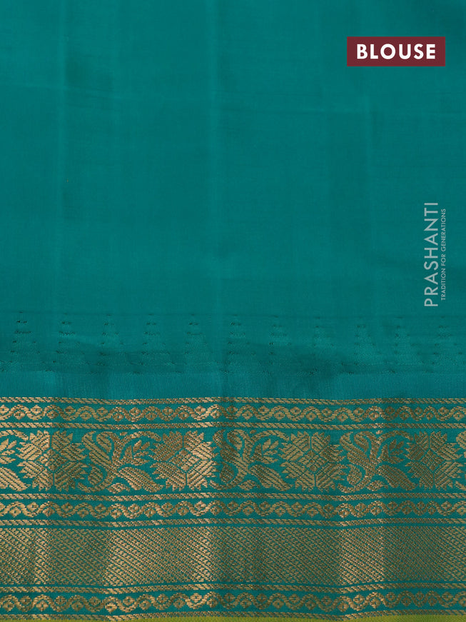 Pure gadwal silk saree lavender shade and green with zari woven buttas and temple design zari woven border