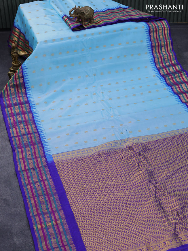 Pure gadwal silk saree light blue and blue with annam zari woven buttas and temple design zari woven border