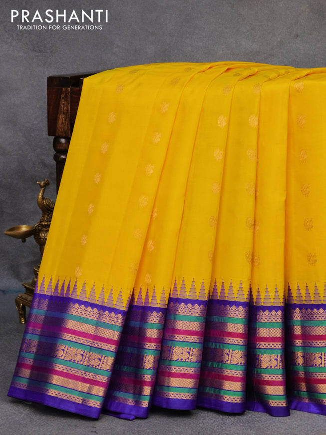 Pure gadwal silk saree yellow and blue with annam zari woven buttas and temple design zari woven border