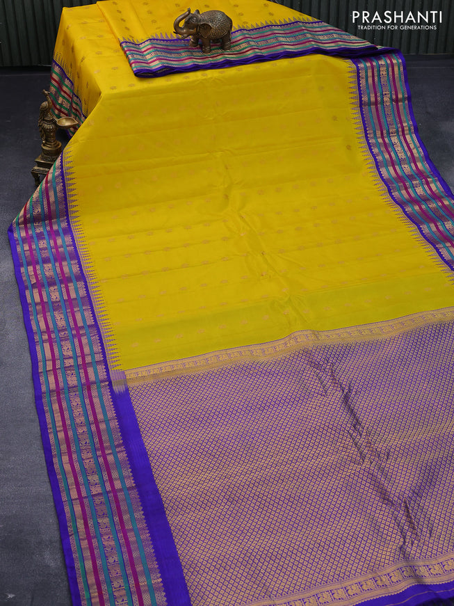 Pure gadwal silk saree yellow and blue with annam zari woven buttas and temple design zari woven border