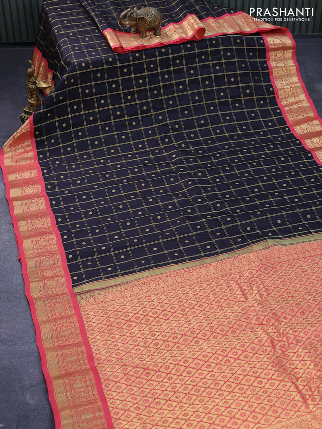 Pure gadwal silk saree black and peach pink with allover zari checks & buttas and zari woven border