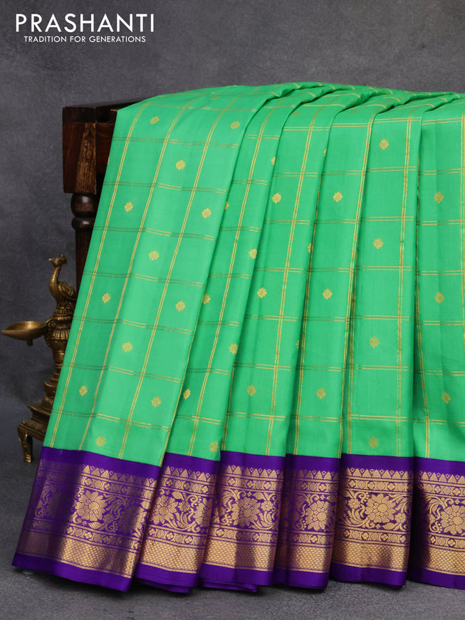 Pure gadwal silk saree light green and violet with allover zari checks & buttas and zari woven border