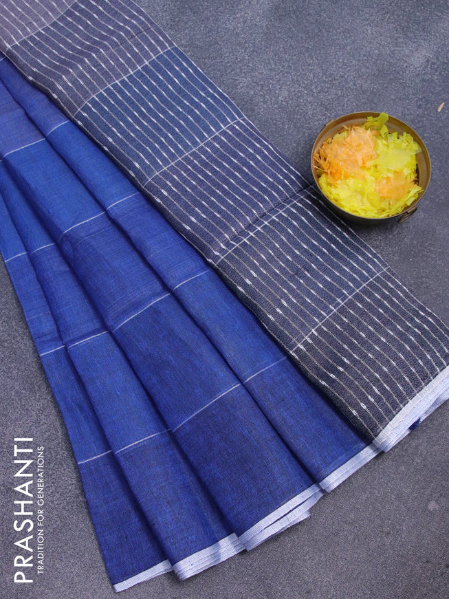 Pure linen saree blue and grey with allover silver zari stripe weaves and silver zari woven piping border