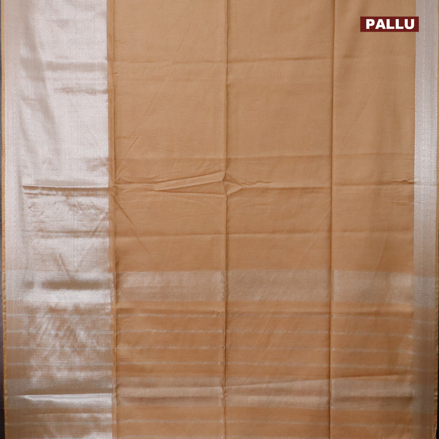 Semi tussar saree sandal and pink with plain body and long silver zari woven border & kalamkari printed blouse