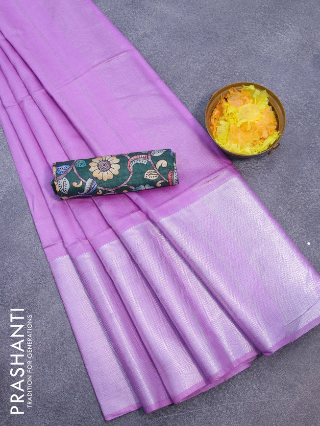 Semi tussar saree lavender shade and green with plain body and long silver zari woven border & kalamkari printed blouse