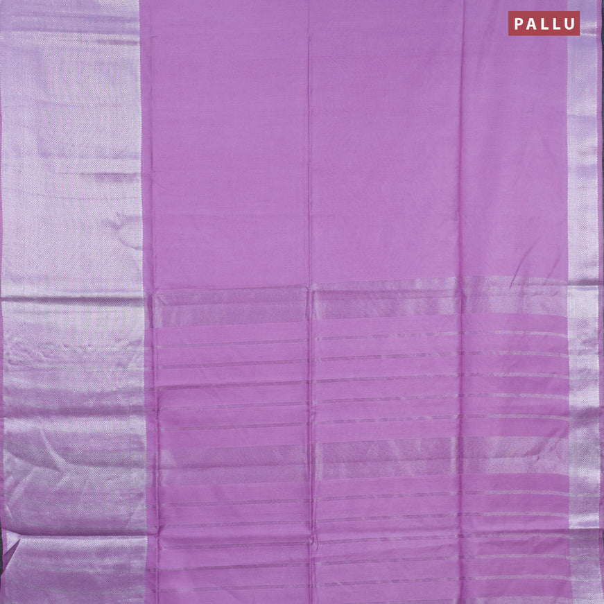Semi tussar saree lavender shade and green with plain body and long silver zari woven border & kalamkari printed blouse