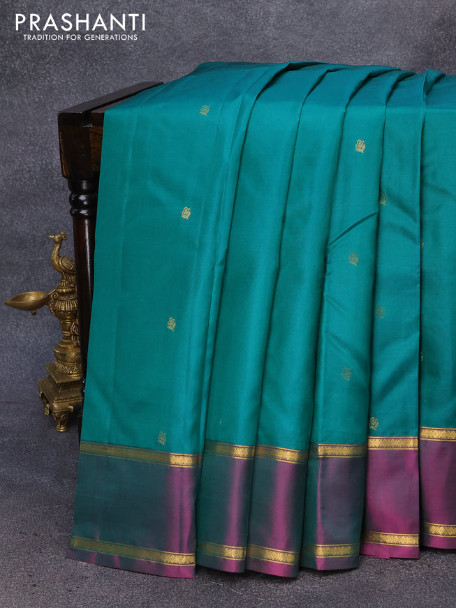 Pure kanjivaram silk saree green and dual shade of greenish pink with zari woven buttas and rettapet zari woven border