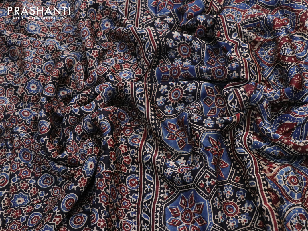 Modal silk saree black with allover ajrakh prints and printed border
