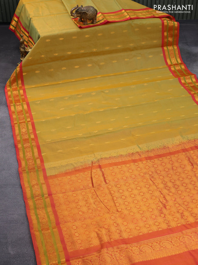 Gadwal silk cotton saree dual shade of greenish mustard and pink with allover zari woven buttas and zari woven border