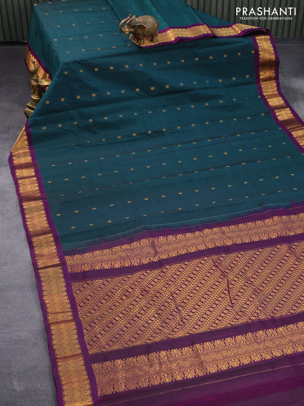 Gadwal silk cotton saree peacock green and purple with allover zari woven buttas and zari woven border