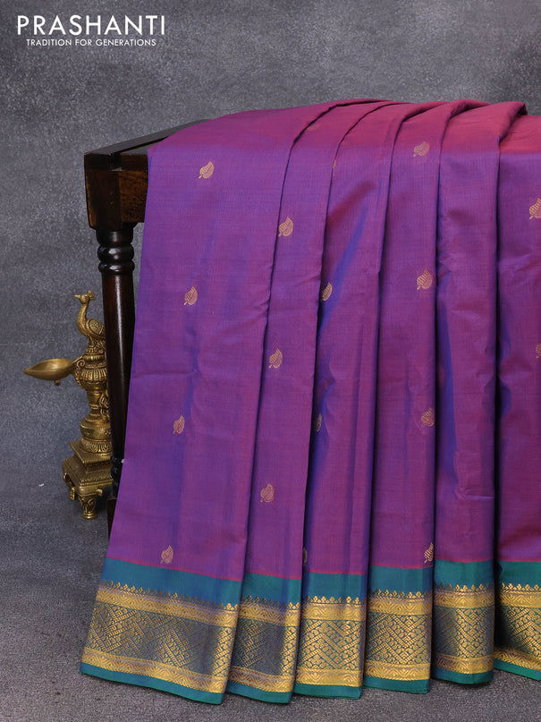 Gadwal silk cotton saree dual shade of purple and dual shade of bluish green with zari woven leaf buttas and zari woven border