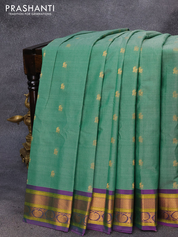 Gadwal silk cotton saree green shade and dual shade of purple with allover paisley zari woven buttas and zari woven border