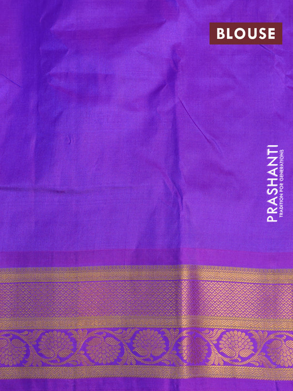 Gadwal silk cotton saree dual shade of bluish green and violet with allover paisley zari woven buttas and zari woven border