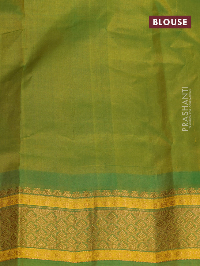 Gadwal silk cotton saree dual shade of orangish pink and green with allover paisley zari woven buttas and zari woven border