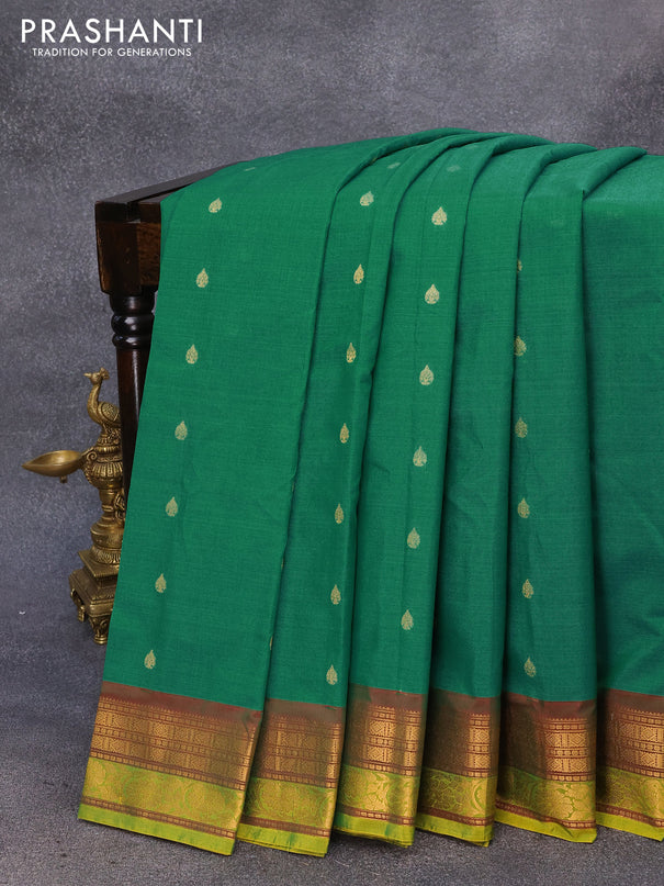 Gadwal silk cotton saree green shade and maroon with allover zari woven buttas and floral zari woven border