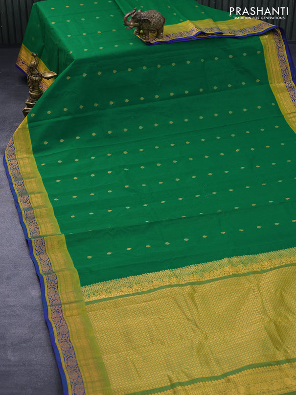 Gadwal silk cotton saree green and mustard green shade with allover zari woven buttas and floral zari woven border